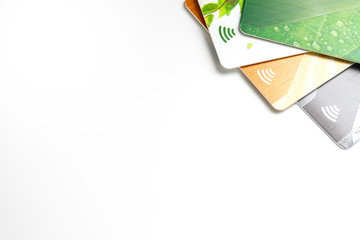 Credit cards with contactless payment. Pile of credit cards on white isolated background