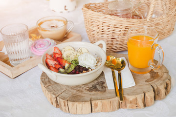 Mix fruits with milk yoghurt breakfast set.