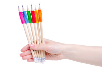Pencil with a rubber in hand on a white background. Isolation