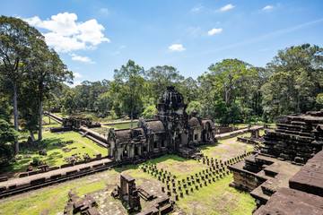 Angkor Wat, Cambodia September 6th 2018 : Tourists walking towards the main entrance at the famous...