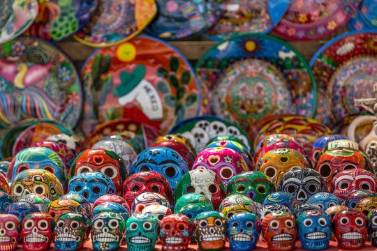 Colorful painted skulls (Calaveras) at market during the Day of the Dead holiday in Mexico