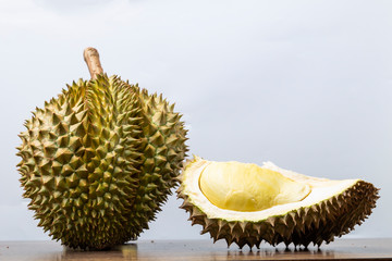 Obraz premium Durian on wood table and gray background.
