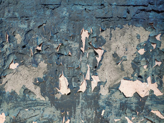 Concrete wall cracked paint, paint abstractly behind the concrete. Texture, pattern, background. old paint