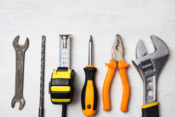 set of tools on wooden background