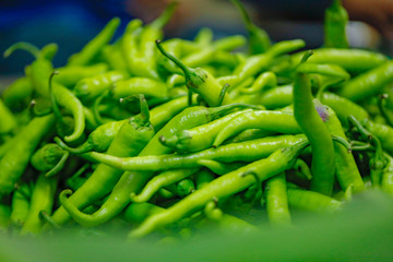 fresh green and red chilies shop in market