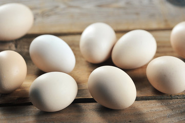 chicken eggs on wooden rustic