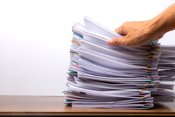 Stack of document paper with colorful paperclip