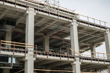 Fototapeta premium modern concrete bulding in construction with air conditioning piping