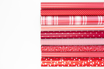 Red and White Gift Wrapping Paper Rolls in Variable Colors