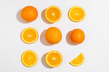 Flat lay composition with oranges on white background. Top view