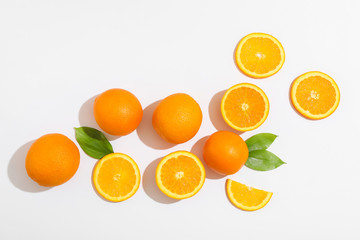 Flat lay composition with oranges and space for text on white background. Top view