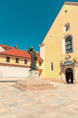 Fototapeta premium Street of Varazdin, Croatia, with a statue of bishop Grgur Ninski.