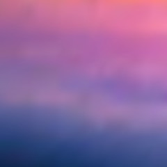 The sky at sunset, evening twilight, blurred background in purple, lilac and blue tones.