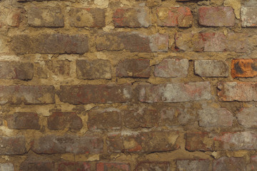 Rough aged masonry background Backdrop of old red bricks with shabby texture