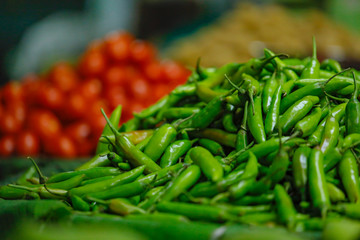 fresh green and red chilies shop in market