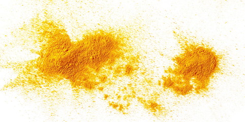 Turmeric powder pile isolated on white background and texture, top view