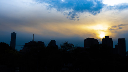 Shadow of building before sunset in the evening  with blue sky cityscape.