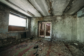 Fototapeta na wymiar Inside the hotel in abandoned Pripyat city in Chernobyl Exclusion Zone, Ukraine