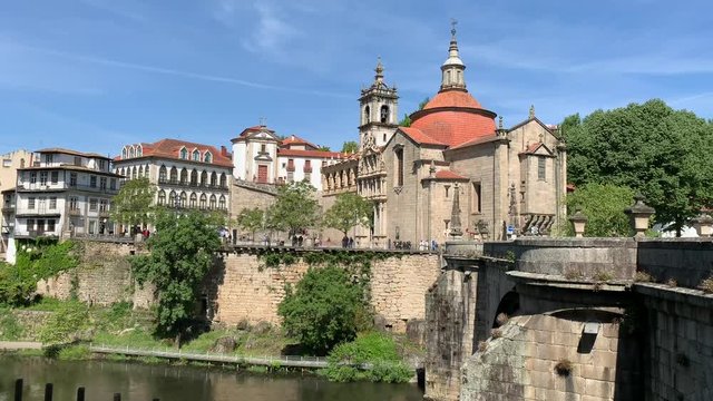 Beautiful view of the Sao Goncalo church and bridge on a clear spring day