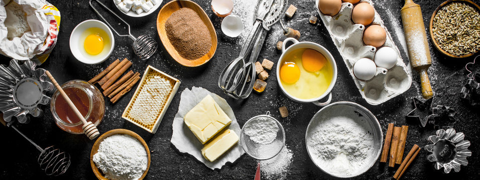 Baking background. Flour and various ingredients for dough.