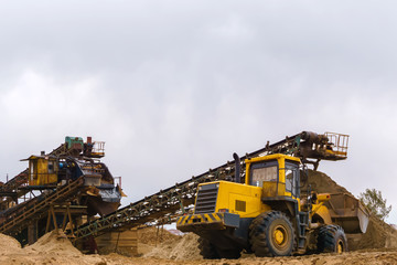 sand and gravel separator and bucket loader