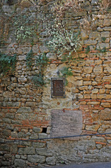Fototapeta na wymiar Forli, Castrocaro, old medieval building religious decoration.