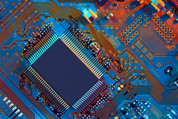 Electronic circuit board close up.