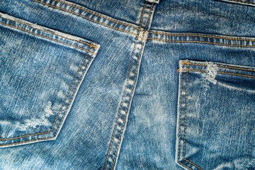Fototapeta premium Close up of blue denim jeans fabric texture background.