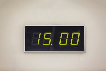Black digital clock on a white background showing time 15.00 minutes