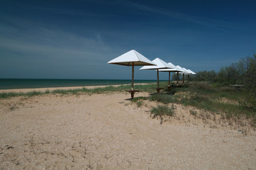 Sheds on the beach on the sea of Azov, Russia.