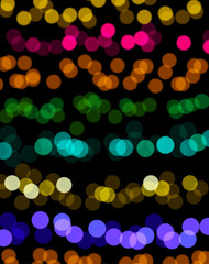 Christmas background with blur glowing lanterns.