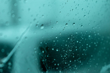 water drops on glass background with space for your logo or text