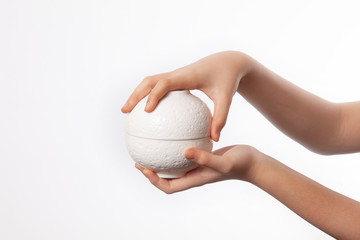 Porcelain dish bowl in hand isolated on white background