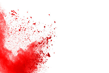 Freeze motion of red powder exploding, isolated on white background. Abstract design of red dust cloud. Particles explosion screen saver, wallpaper