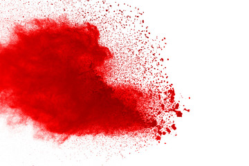 Freeze motion of red powder exploding, isolated on white background. Abstract design of red dust cloud. Particles explosion screen saver, wallpaper