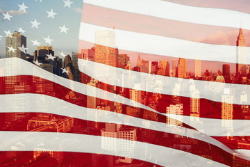 Double exposure with the American flag and the skyscrapers of New York City, Manhattan.  USA....