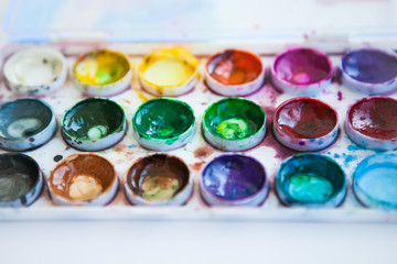 Palette with paints (watercolor)