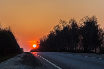 Beautiful sunset on a country highway