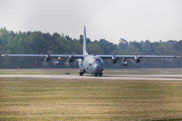 Lockheed C-130H Hercules taxis off the runway at RAF Lakenheath, Suffolk after landing in April...