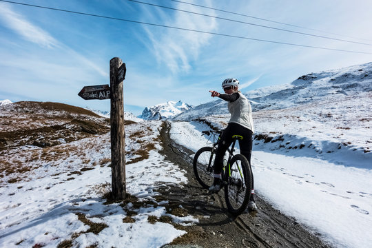 Mountain Biking In The Pennine Alps, Near Zermatt; Valais, Switzerland