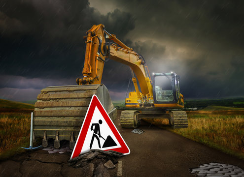 Bagger im Straßenbau mit Warnschild Achtung Baustelle