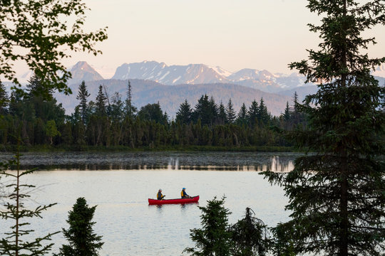 A Couple Canoeing On Stone Step Lake; Homer, Alaska, United States Of America