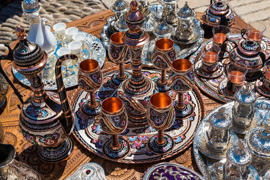 Tea Sets, Goblets And Trays For Sale At The Mostar Bridge; Mostar, Bosnia And Herzegovina