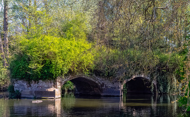 Remains of old multi-arch stone Castle Bridge in Warwick, Warwickshire, United Kingdom