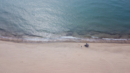 Fototapeta na wymiar Shoreline photographed from drone. Sea and sand