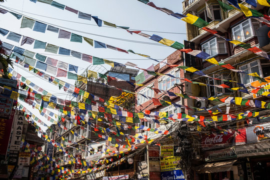Buddhist prayer flags in the city of Kathmandu; Kathmandu, Nepal