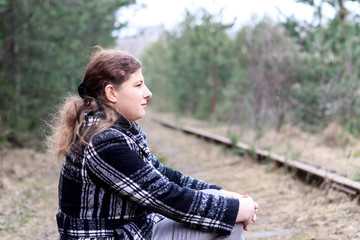 Obraz premium girl. Railway. Spring. she walks along the paths. have toning