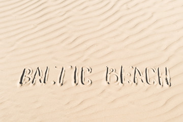 Plakat inscription on sand: baltic beach