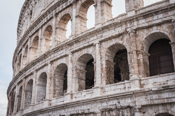 Fototapeta premium Close-up on the older facade on the other side of the Coliseum in Rome