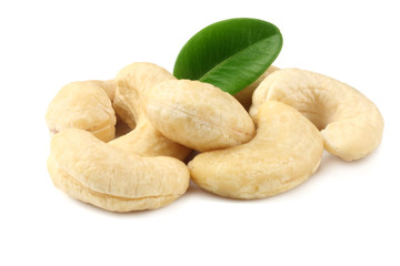 cashew with green leaves isolated on white background